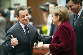 French President Nicolas Sarkozy and German Chancellor Angela Merkel