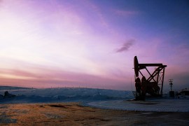 North Dakota sunset and oil/gas rig
