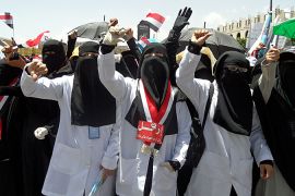 Yemeni women shout slogans during an anti-government demonstration demanding the resignation of Yemeni President Ali Abdullah Saleh