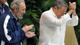 Fidel Castro (L) and Raul Castro
