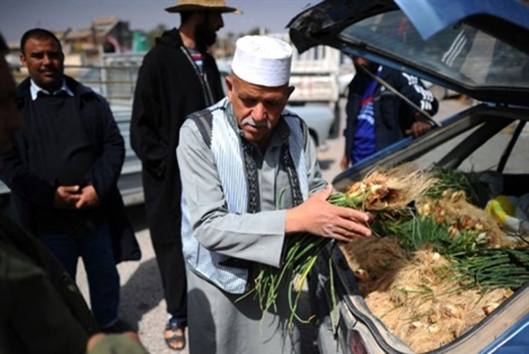 Libyan man selling vegetables - Misurata
