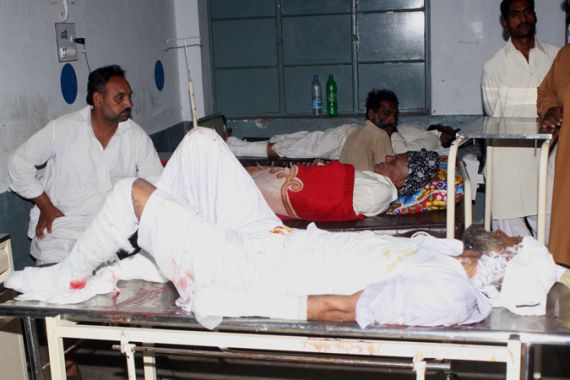 People who were injured in a bomb blast in a passenger bus receive medical treatment at a local hospital in Kharian