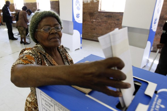 South African voter casting ballot