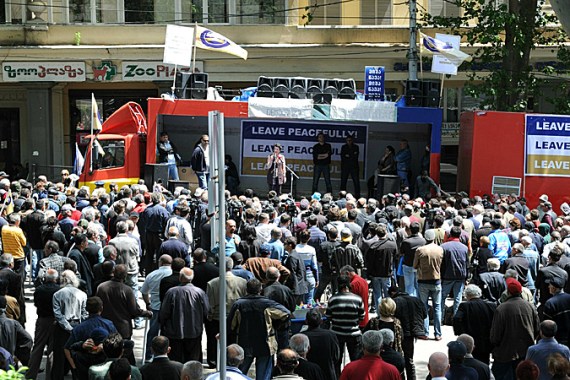 Georgian opposition leader Nino Burjanadze (background C) speaks at a rally in Tbilisi on May 23, 2011