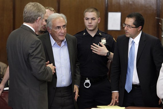 Strauss-Kahn with legal team