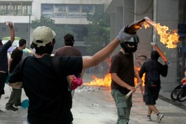 Greek protester with molotov cocktail
