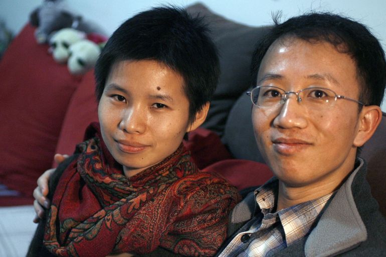 Hu Jia and wife