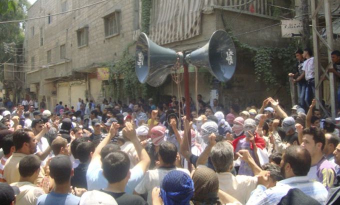 protesters rally in Syria''s capital on July 8 [Reuters]