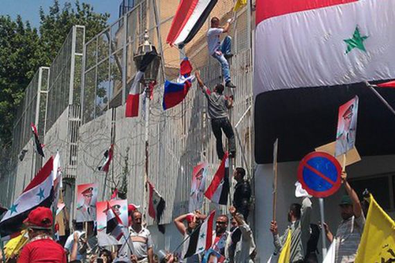Protesters scale US embassy in Damascus - facebook photo
