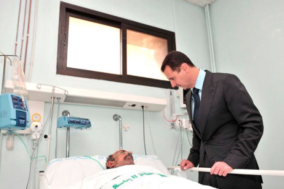 Bashar al-Assad at hospital bed