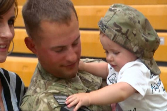 US troops soldier baby family