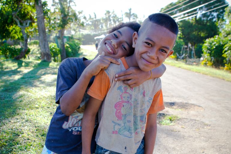 Boys in Tonga for 101 East - An Ocean Divide