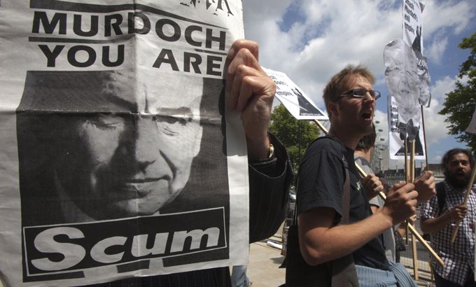 anti-Murdoch slogans at a protest in London