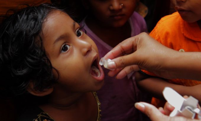 Bangladeshi girl getting vaccine shot - for WITNESS programme