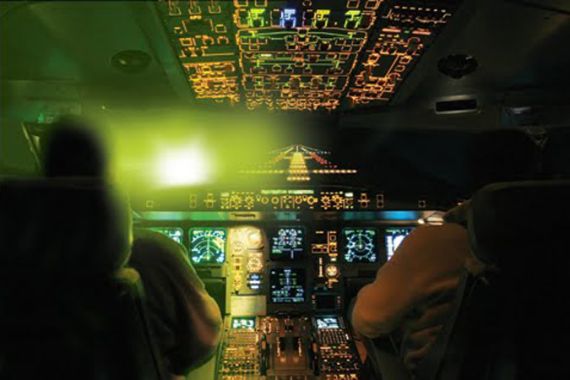 green laser cockpit airplane
