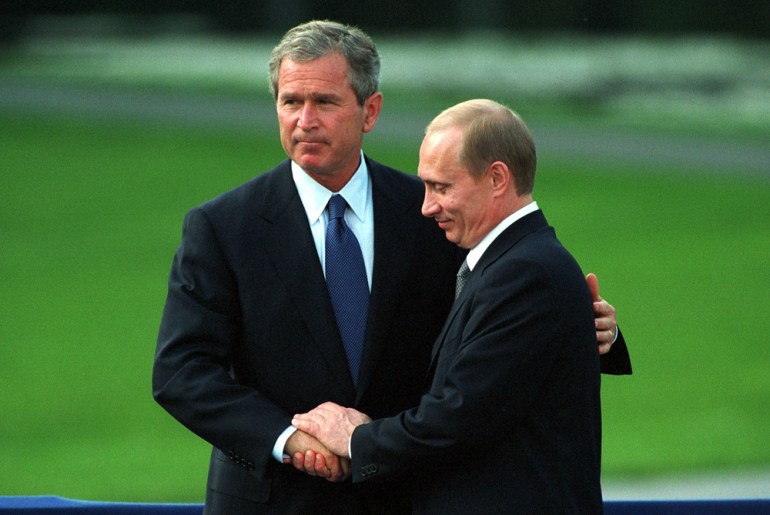 Vladimir Putin and George W Bush