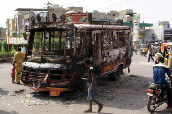 Karachi violence bus pakistan burnt burn