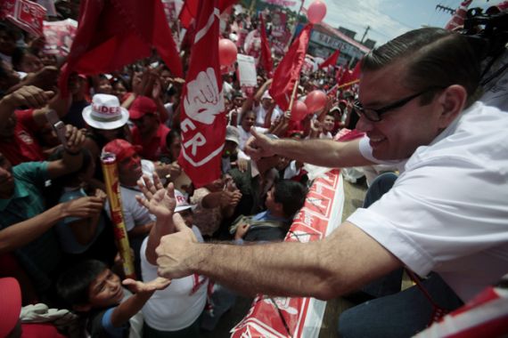 Guatemalan presidential candidate Baldizon of the LIDER political party greets party supporters before his last
