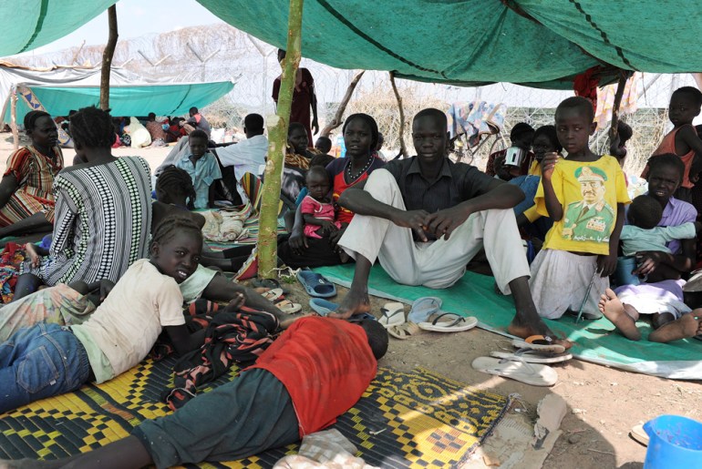 Sudanese people in makeshift tents
