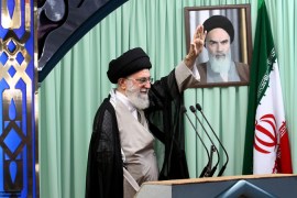 Ayatollah waves at ceremony
