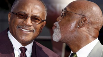 Former US athletes Tommie Smith, left, and John Carlos pictured in 2008 [EPA]