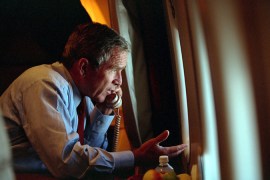 George Bush on telephone