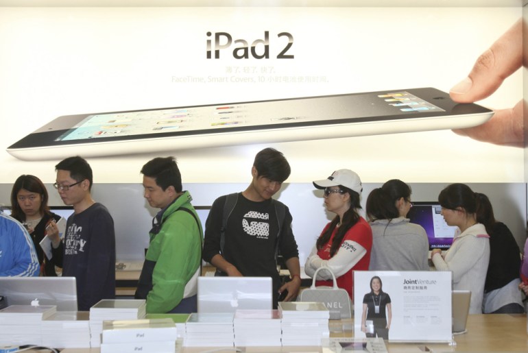Apple Launches iPad 2 In China - iprotest activate programme - photo gallery 1000x669