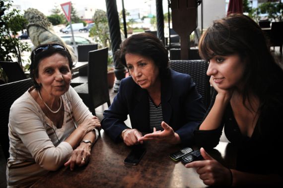 Tunisian women vox pops: Mounia Jameleddine and Karthoum Triki of the Karama Association meet with a third woman [Photo: Aude Osnowycz/Al Jazeera]