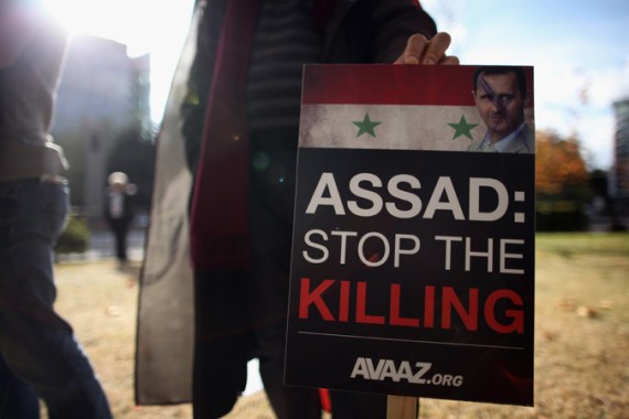 Protesters Gather At Syrian Embassy In London