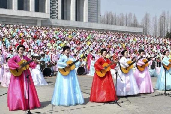 North Korean women attend a grand chorus event held to mark North Korean founder Kim Il-Sung''s 100th birth anniversary in Pyongyang