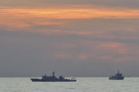 File handout photo of Chinese surveillance ships in the South China Sea