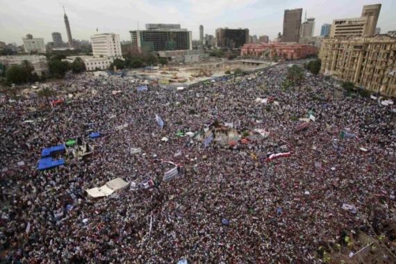 People gather for a mass protest in Tahrir square