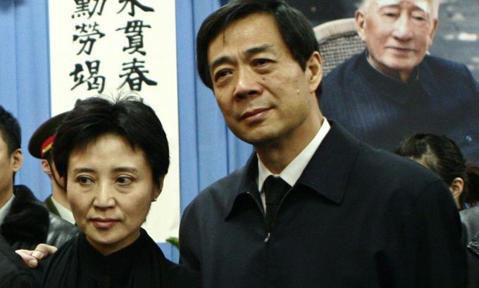 Bo Xilai (R) and his wife Gu Kailai