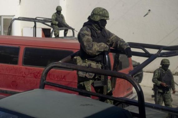 Mexican soldiers patrol in Ciudad Mier,
