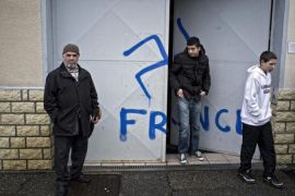 Worshipers leave a moske where nazi graf