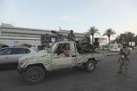 inside story - libya, tripoli airport, armed militia