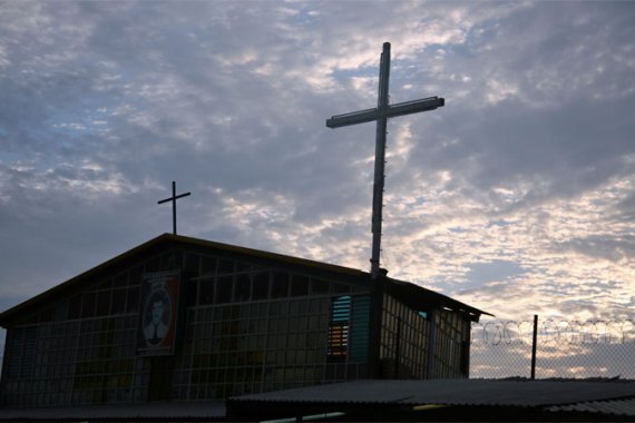 The shrine of Jesus Malverde as night falls in Sinaloa. [Chris Arsenault/Al Jazeera]