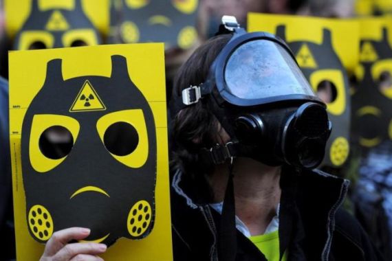 Anti-nuclear activists participate in a