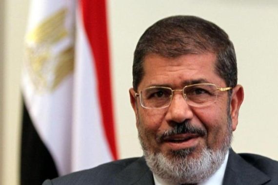 Egyptian President Mohamed Morsi meets with Malaysia''s Min. of Higher Education Khaled Nordin