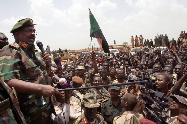 Omar al-Bashir speaks to the military