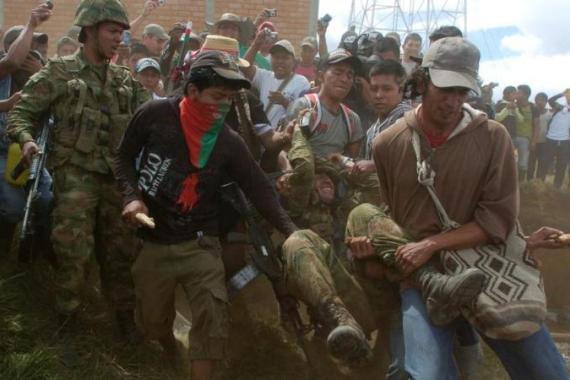 NATIVES CLASH WITH SOLDIERS TO LEAVE MILITAR CONTROL BASE
