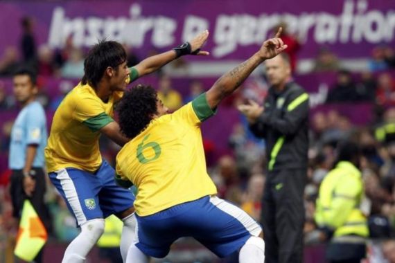 Brazil''s Neymar celebrates with teammate Marcelo after scoring their second goal against Belarus during their men''s Group C football match at the London 2012 Olympic Games at Old Trafford in Manchester