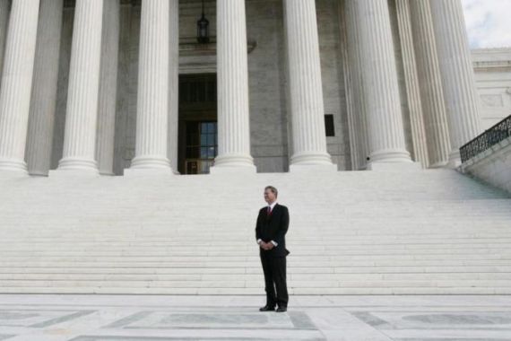 Chief Justice of the United States John Roberts is pictured on the front plaza of the Supreme Court in Washington
