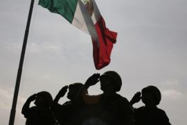 Members of Mexico''s military police salute Mexico''s Secretary of Defence Guillermo Galan during a rehearsal for the celebrations of the 201st anniversary of Mexico''s independence at a military base in Mexico City
