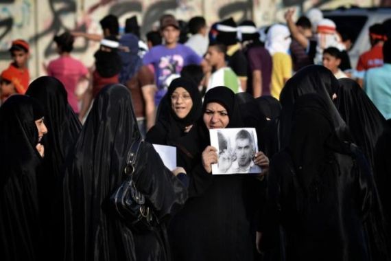 Bahraini Shiite Muslim women take part i