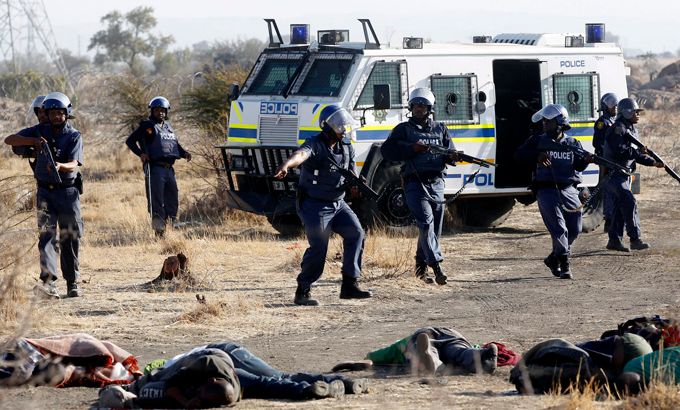Miners protest South Africa police open fire