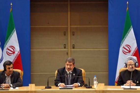 At Tehran meeting Morsi criticises Syria