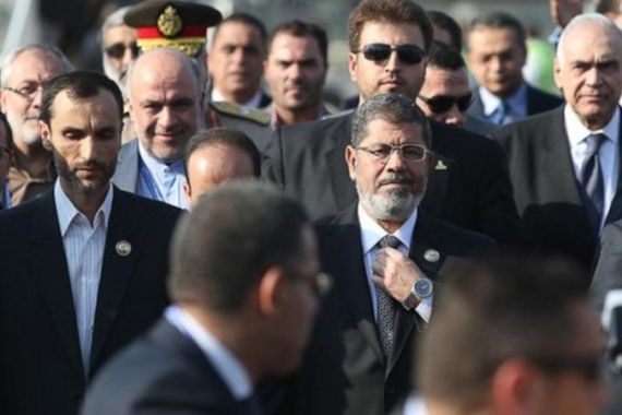 Egypt''s President Mohamed Mursi arrives in Mehrabad airport in Tehran ahead of the 16th summit of the Non-Aligned Movement