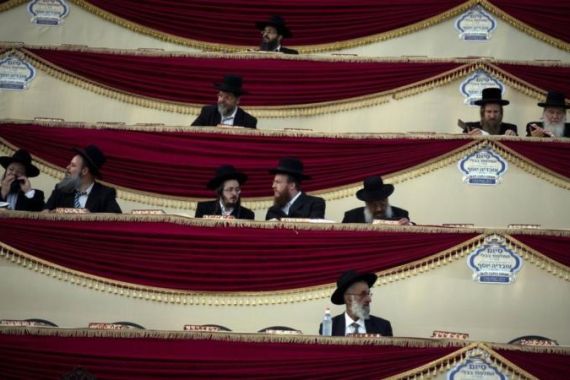 Ultra-Orthodox Jews convene at a sports