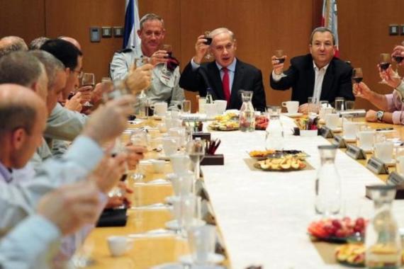 Israeli Prime Minister Benjamin Netanyahu with Defense Minister Ehud Barak and Chief of Staff toast the new year in Tel Aviv with the Israeli Defense Forces high officers